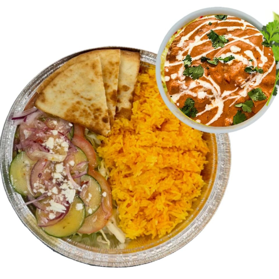 Halal platter with yellow rice, salad, pita bread, and a side of creamy orange curry.