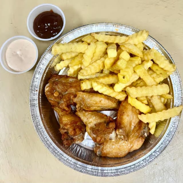 Chicken Wings with Fries.