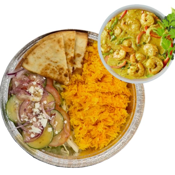 Halal shrimp curry with yellow rice, pita bread, and a side salad in a foil container.