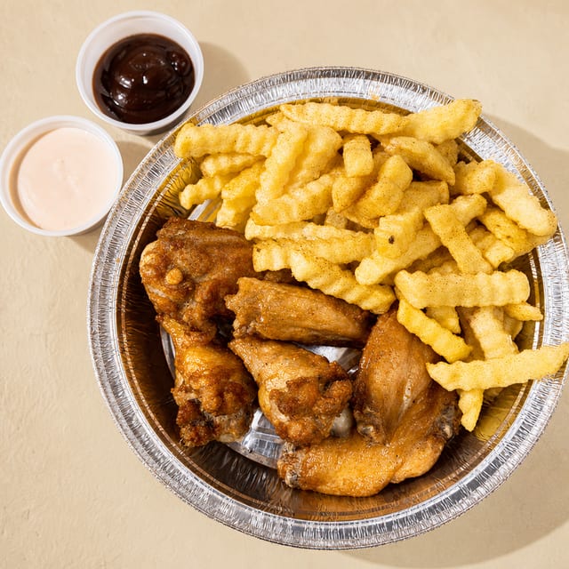 Chicken Wings with Fries.